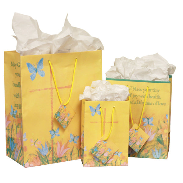 Perfect for a baby shower gift, these bags are filled with the joy of a new arrival. The large and small bags feature a cross on the front and back, with the message "May God bless your tiny bundle of joy with health, happiness, and a lifetime of love" on both sides. On the medium bag, the crosses are on the sides and the message is on the front and back.Gift tags are attached to each bag. <br> Bag sizes are 5 1/4" x 7 5/8", 7 5/8" x 9 1/2", and 10 1/2 x 12 3/4&
