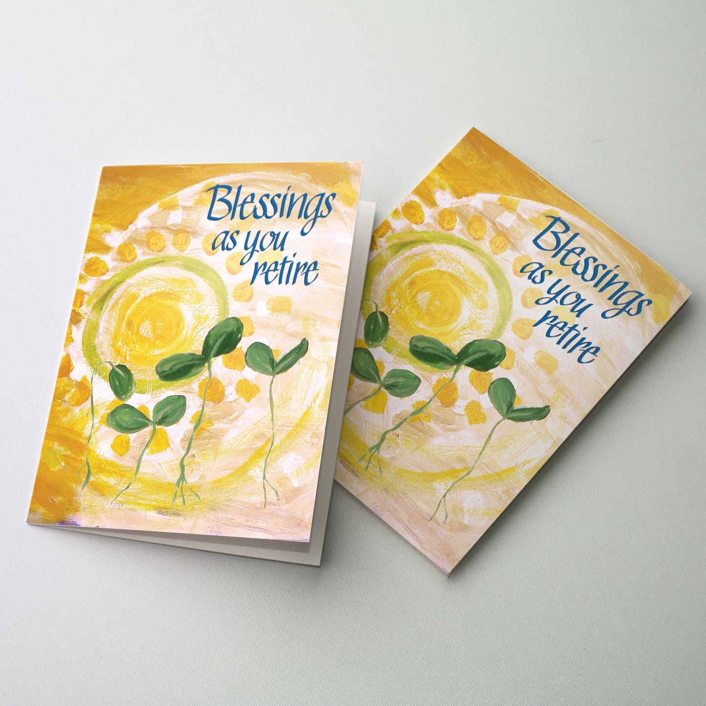 Blue lettering over a background of a brilliant yellow sun shining upon small green sprouts