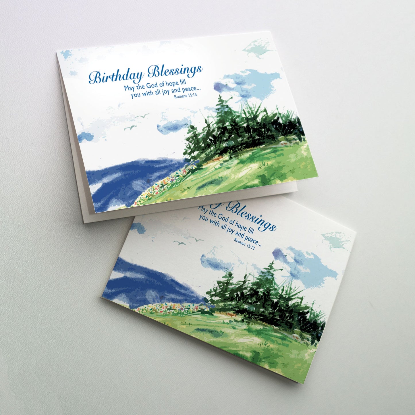 Blurred image of trees on a hill overlooking the sea