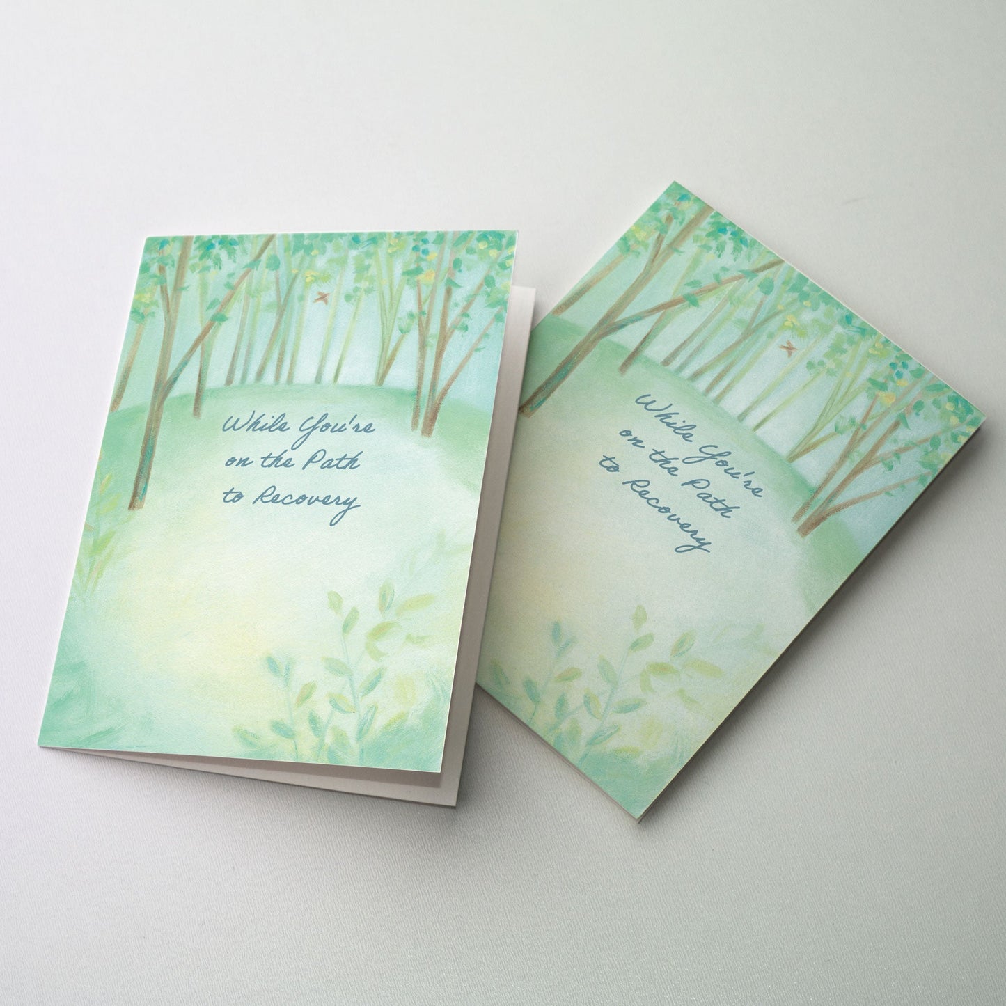 Pathway through a softly painted forest with a solitary bird.