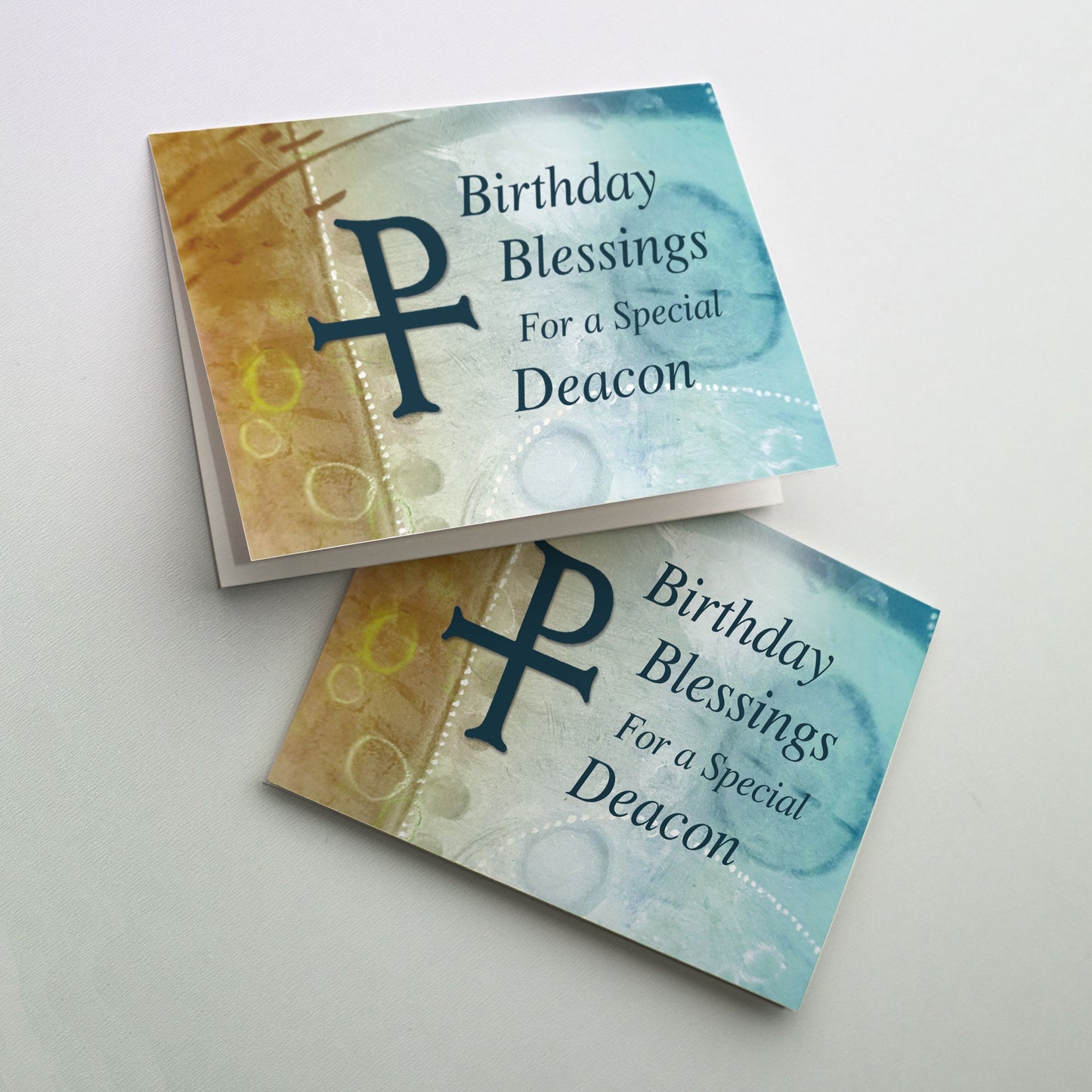 Have a deacon in your church community? Let him know how special he is with this elegant birthday card. Painterly lines by artist Roann Mathias express a shower of birthday blessings. The sacred monogram for Christ spans the art and cover title. Horizontal fold.