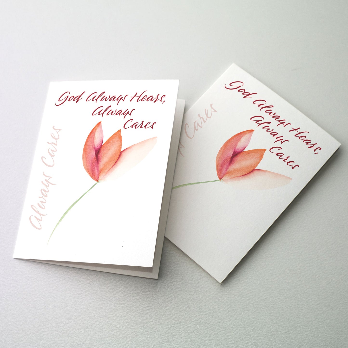 Express your thoughts of concern and prayer in calligraphy accented by a coral colored flower. The cards measure 5" x 7". Printed on recycled paper.