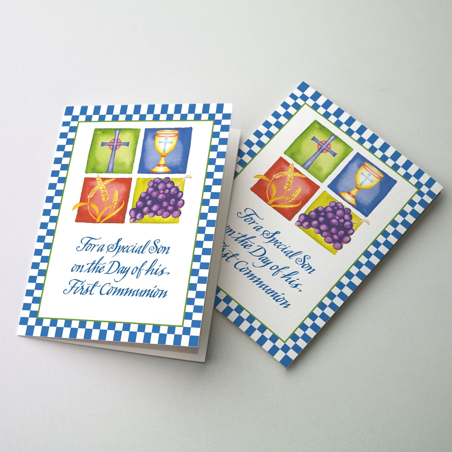 Four-block illustration of a cross, chalice, wheat and grapes with a checkered border. Rejoice with that special son as he receives his First Communion. 5" x 7" card with matching envelope.