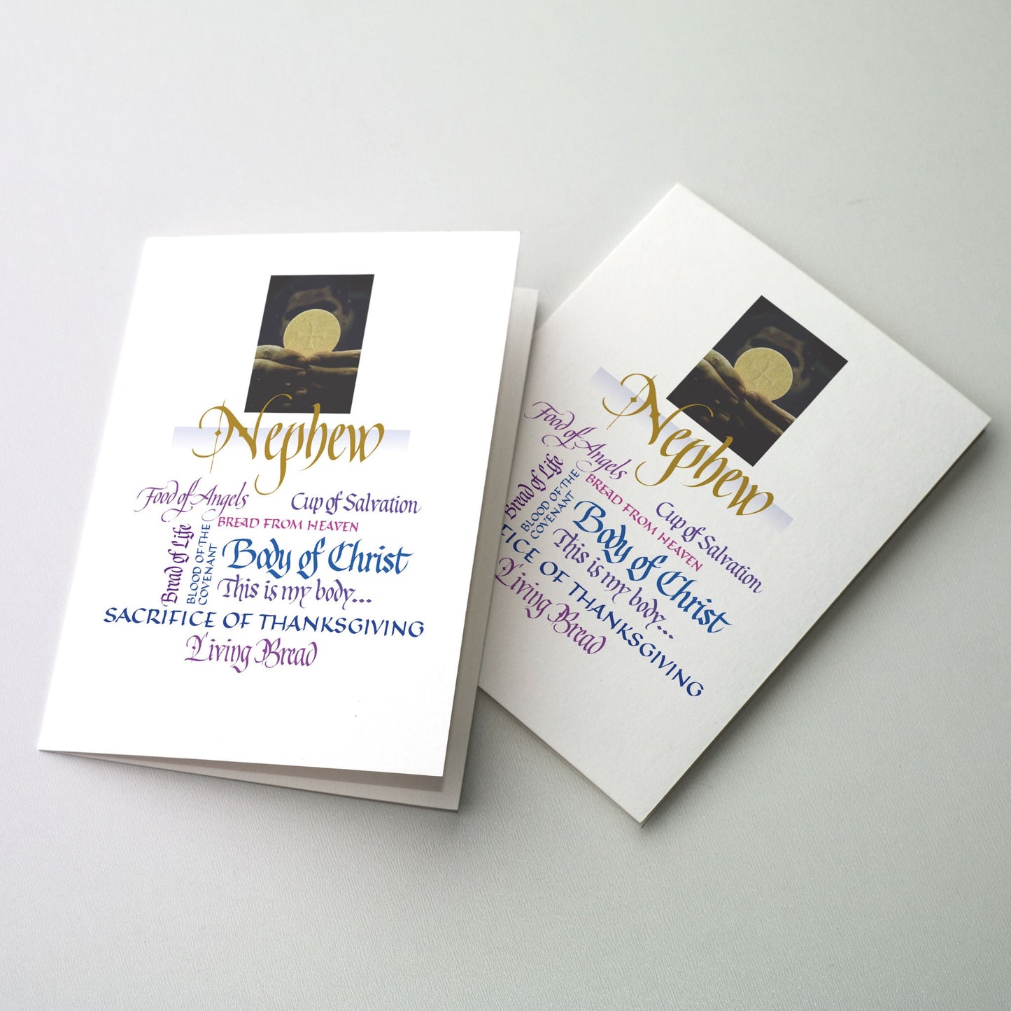 Inset photo of priest elevating the Body of Christ at the top of the card. Below the picture are words and phrases related to First Communion rendered in a collage of several styles of calligraphy and colors.