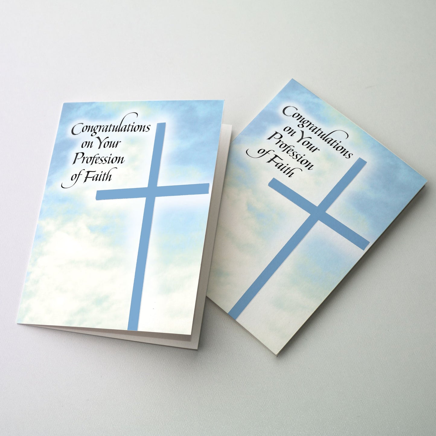 Manipulated photo of a blue cross against a sky of puffy white clouds.