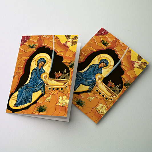 Cropped image of the Nativity from our icon, M08 by Sister Marie Paul, O.S.B. A Great Value! 20 Cards, 21 matching envelopes. * Convenient 4.38" x 5.93" size * Many cards feature hand-done lettering * Appropriate Bible verse included * Quality white envelopes