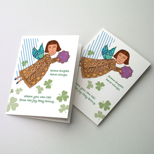 Cute angel with tambourine and shammrocks