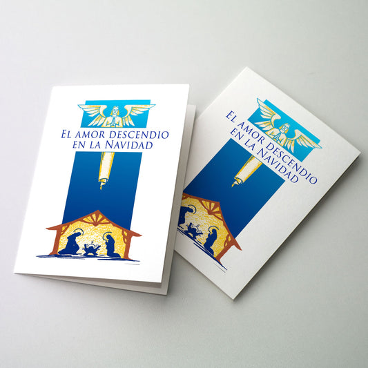 Blue nativity scene with an angel above.