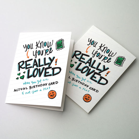 Fun, casual lettering with a postage stamp and smiley face.