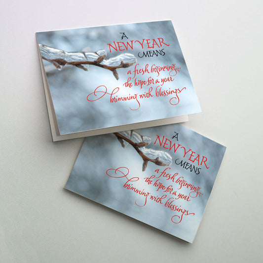 A photo of ice-covered buds on a tree branch. 